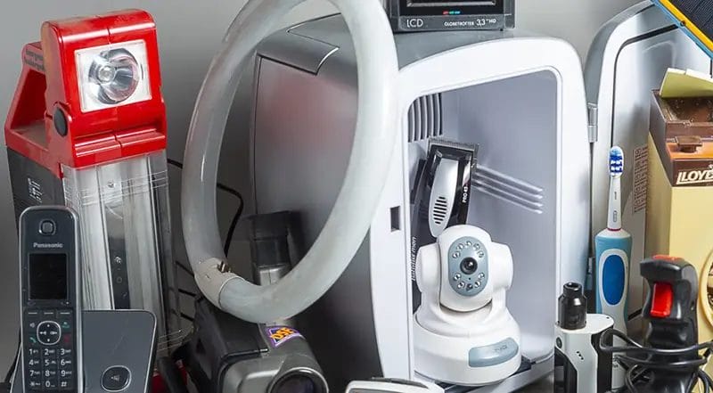 an assorted collection of small electrical items on a table top
